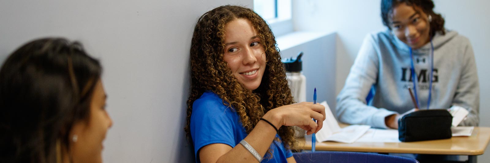 student-athlete in a classroom